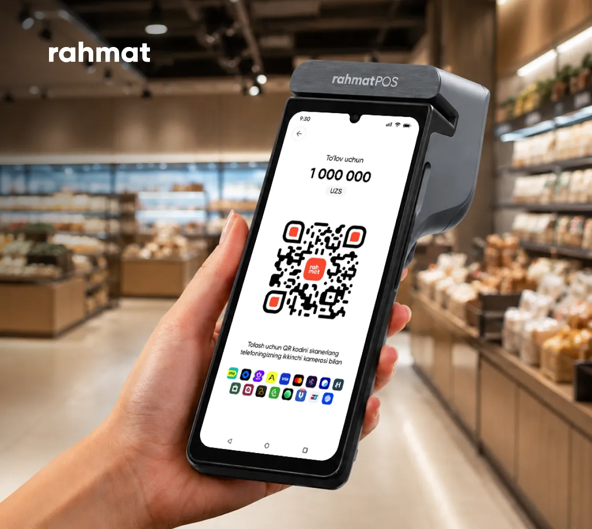 Платёжный терминал Rahmat POS с QR-кодом на экране в магазине